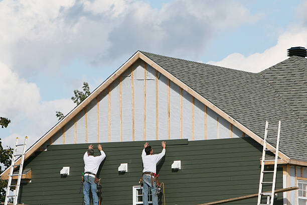 Professional Siding Contractor technician working in Bremen, OH